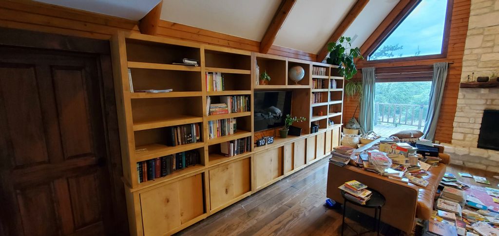 Built In Bookshelves in Maple with Pecan Stain, Euro Style Sliding Doors