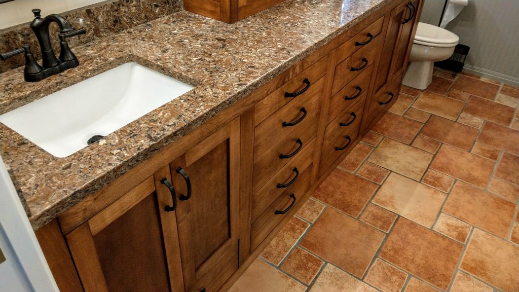 Master Bath European Frameless Shaker with Above Counter Tower. All Maple Facing with Hand Staining (Color customized to match existing furniture)