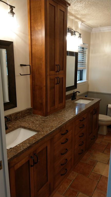 Master Bath European Frameless Shaker with Above Counter Tower. All Maple Facing with Hand Staining (Color customized to match existing furniture)