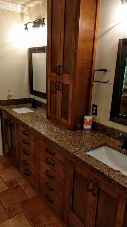 Master Bath European Frameless Shaker with Above Counter Tower. All Maple Facing with Hand Staining (Color customized to match existing furniture)