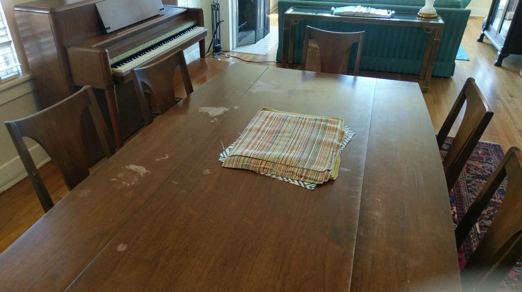 60's-70's post art-deco drop leaf 6' dining table.  Suspected solvent damage. BEFORE