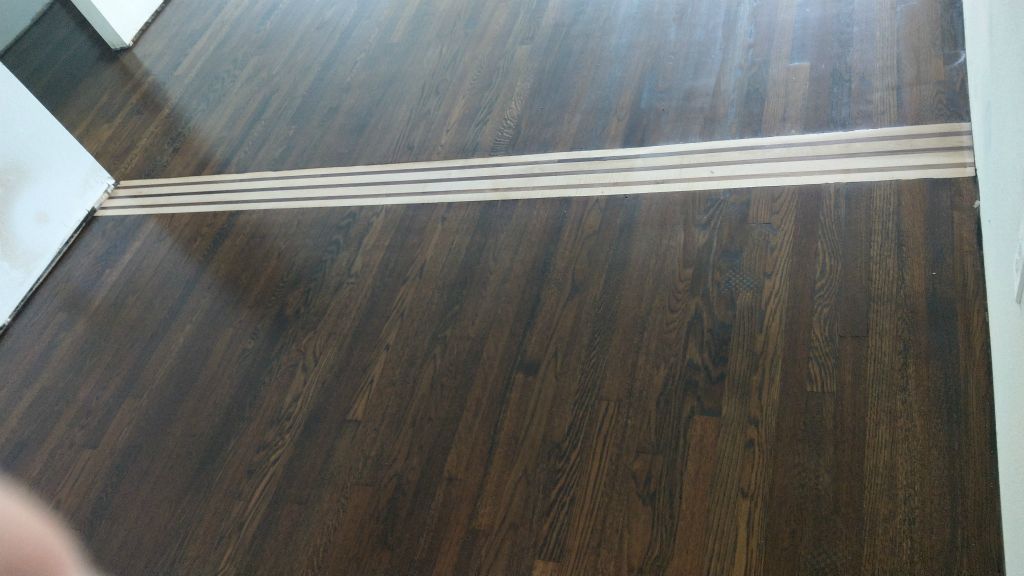 Tiger Strip Maple and Walnut Floor Inlay